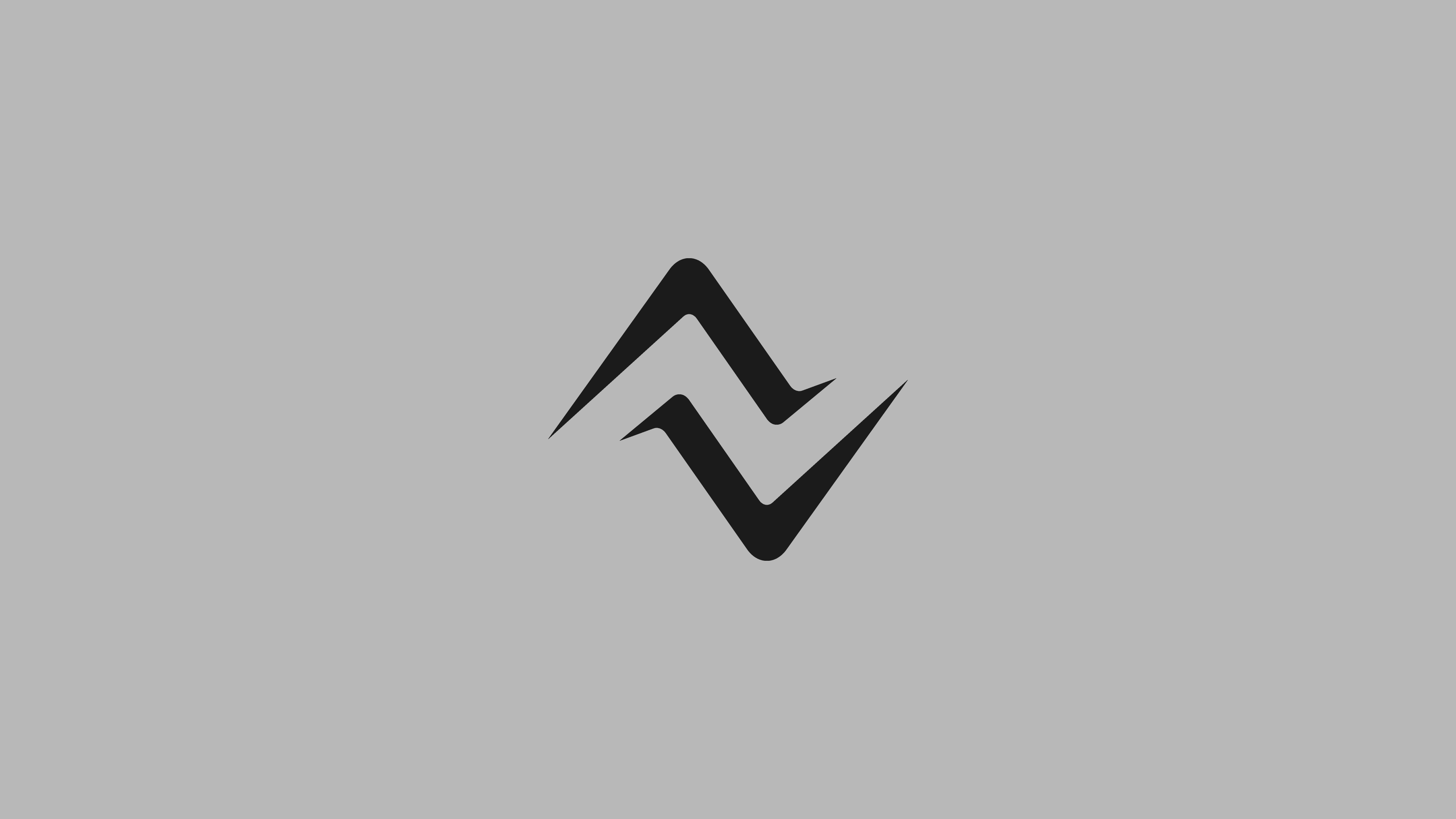 NAVLAW logomark isolated on soft grey background — the navigation course mark showing sharp angular geometry that forms the letter N